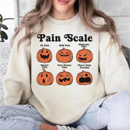 Halloween Nurse Sweatshirt, Pain Scale Fall Pumpkin Nurse T-Shirt, RN Shirt, Pediatric Nurse Gifts, Registered Nurse Hoodie, Nursing Tee - View 1