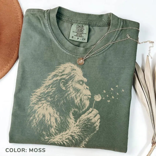Comfort Colors Bigfoot Dandelion T-Shirt, Vintage Sasquatch Nature Tee, Woodland Cryptid Graphic T-Shirt, Outdoor Adventure Shirt, Bigfoot Lover Gift - View 1